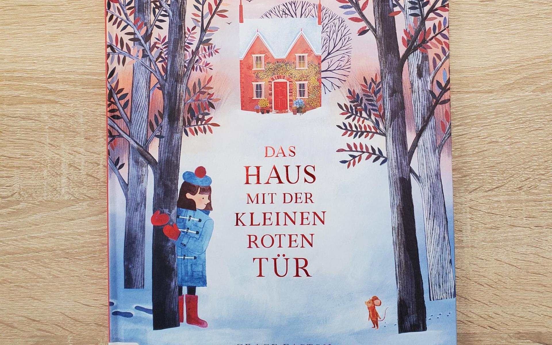 Buch mit Schnee und Mädchen am Cover